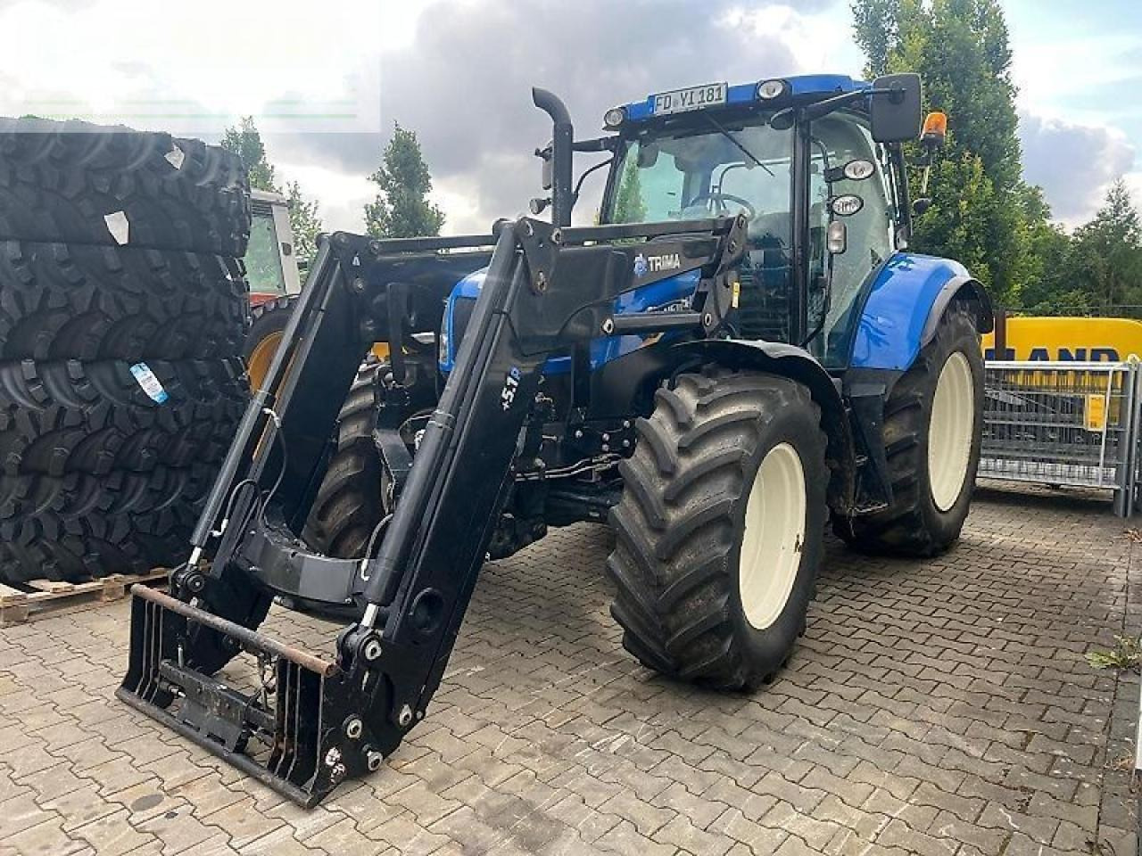 New Holland t 6.175 ec - Traktors: foto 1 New Holland t 6.175 ec - Traktors: foto 1