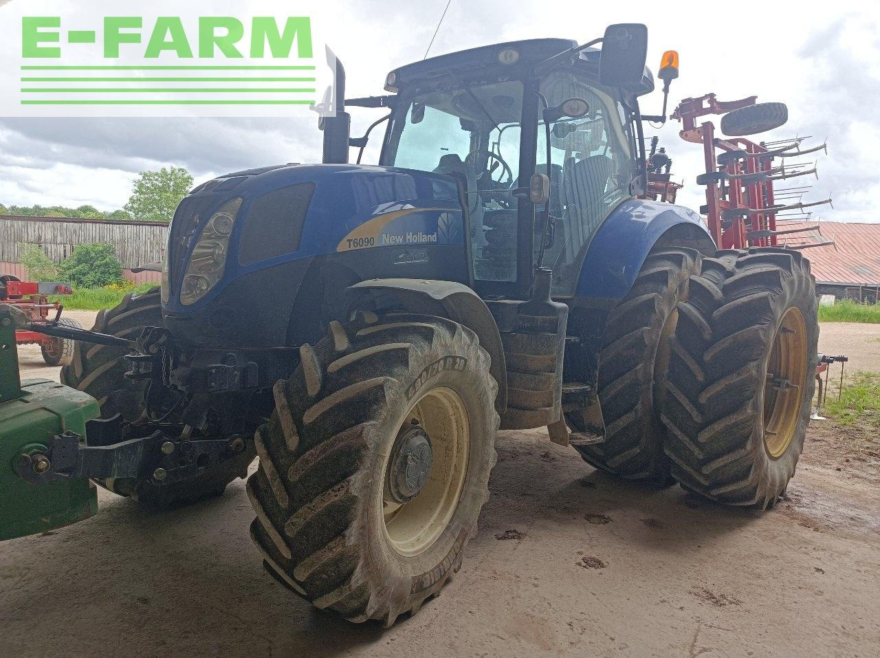 New Holland t 6090 active - Traktors: foto 2 New Holland t 6090 active - Traktors: foto 2