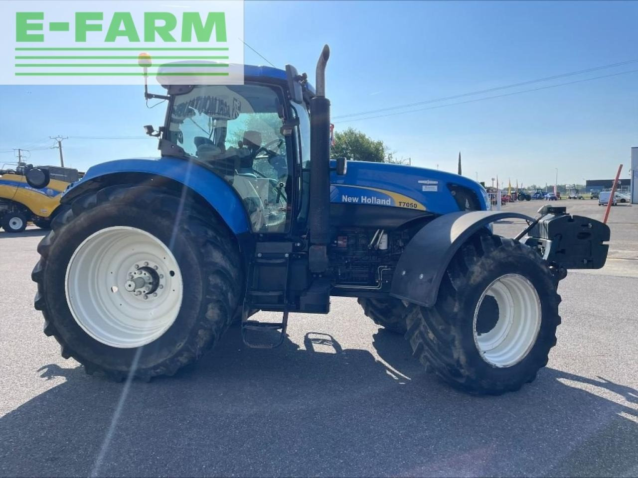 New Holland t 7050 - Traktors: foto 5 New Holland t 7050 - Traktors: foto 5