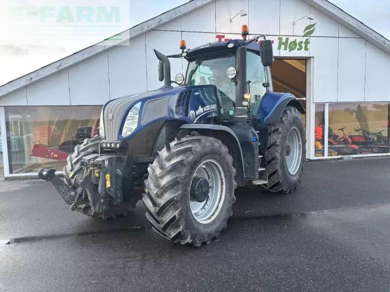 New Holland t 8.410 - Traktors: foto 1 New Holland t 8.410 - Traktors: foto 1