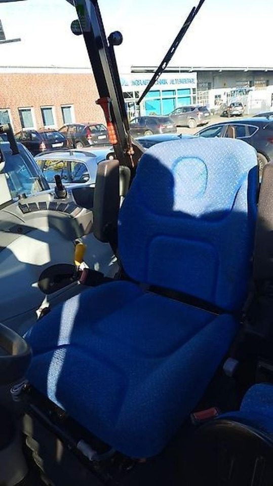 Traktors New Holland t4.55 powerstar Powerstar: foto 8 Traktors New Holland t4.55 powerstar Powerstar: foto 8
