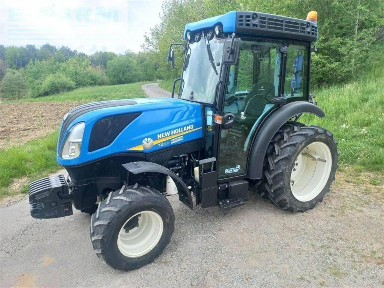 New Holland t4.80 v V - Traktors: foto 1 New Holland t4.80 v V - Traktors: foto 1