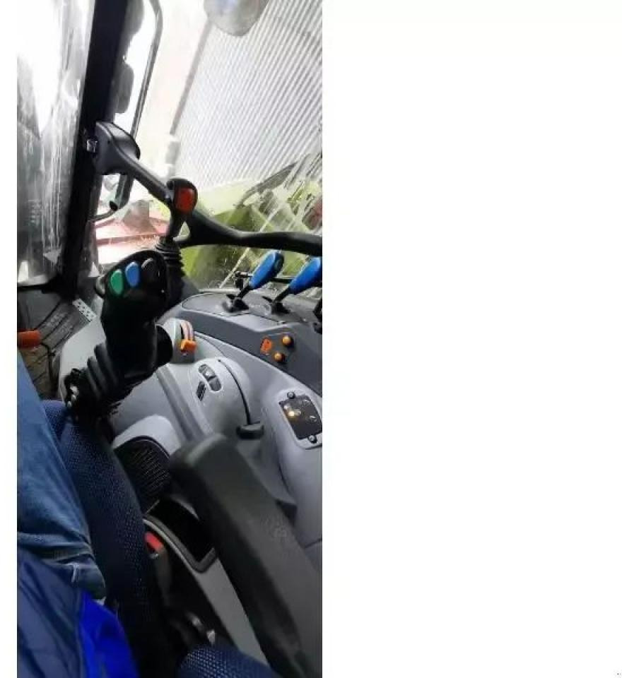 New Holland t5-100ec - Traktors: foto 4 New Holland t5-100ec - Traktors: foto 4