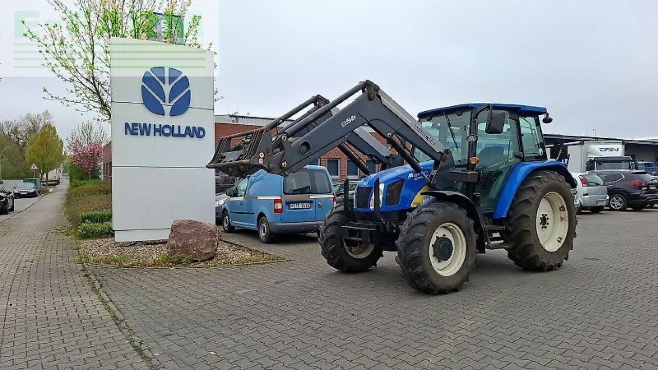 New Holland t5050 - Traktors: foto 1 New Holland t5050 - Traktors: foto 1