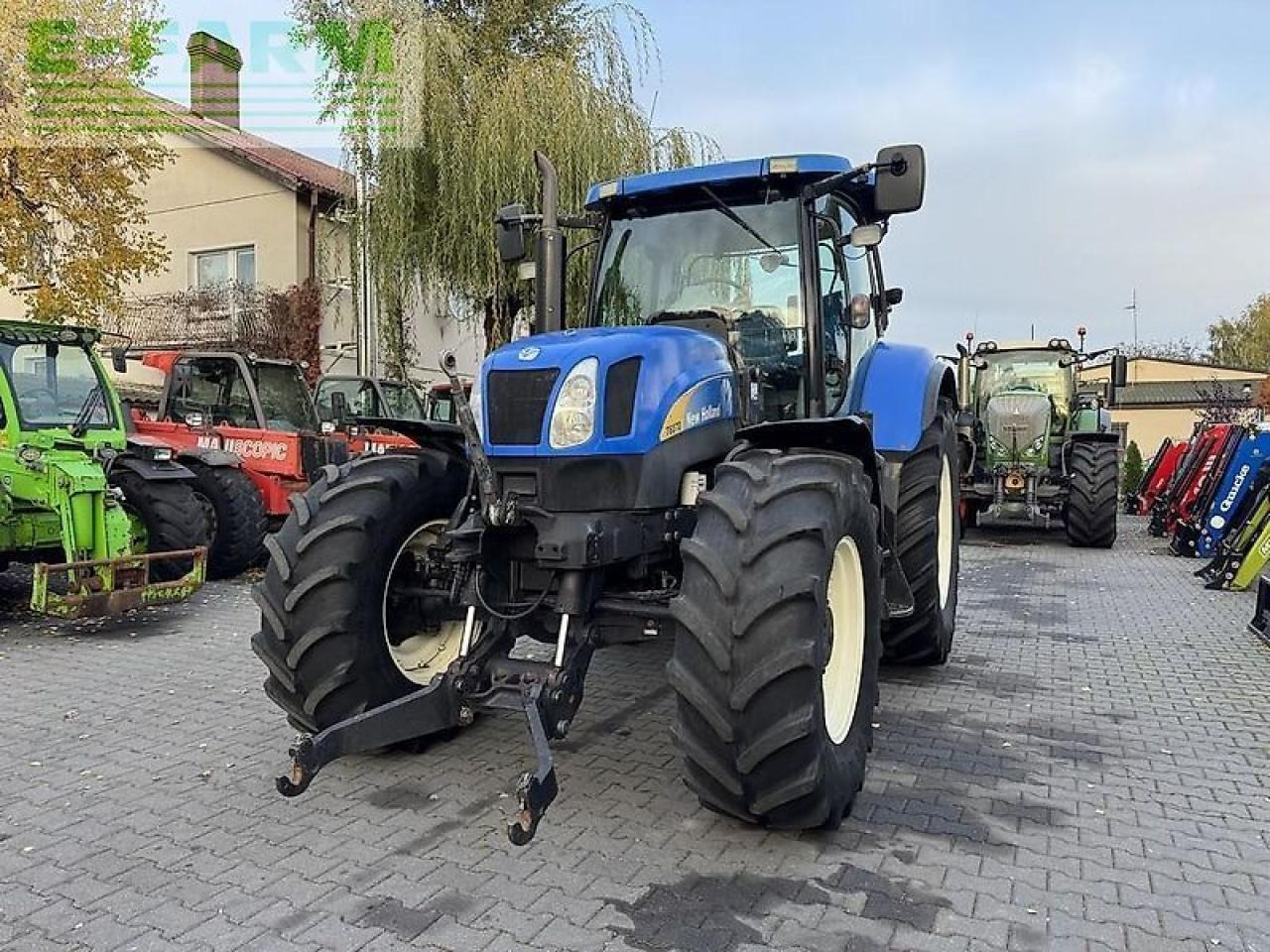 New Holland t6070 powercommand - Traktors: foto 2 New Holland t6070 powercommand - Traktors: foto 2