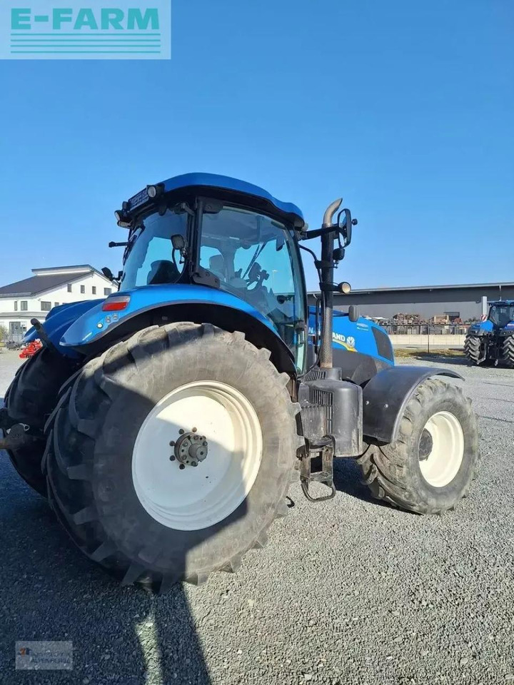 New Holland t7.210 ac - Traktors: foto 2 New Holland t7.210 ac - Traktors: foto 2
