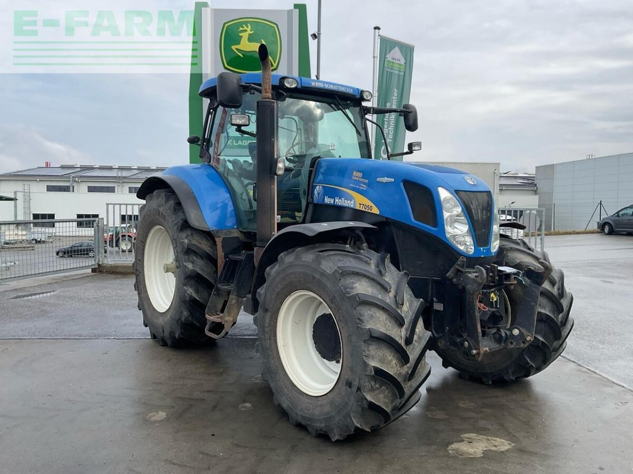 New Holland t7050 - Traktors: foto 2 New Holland t7050 - Traktors: foto 2