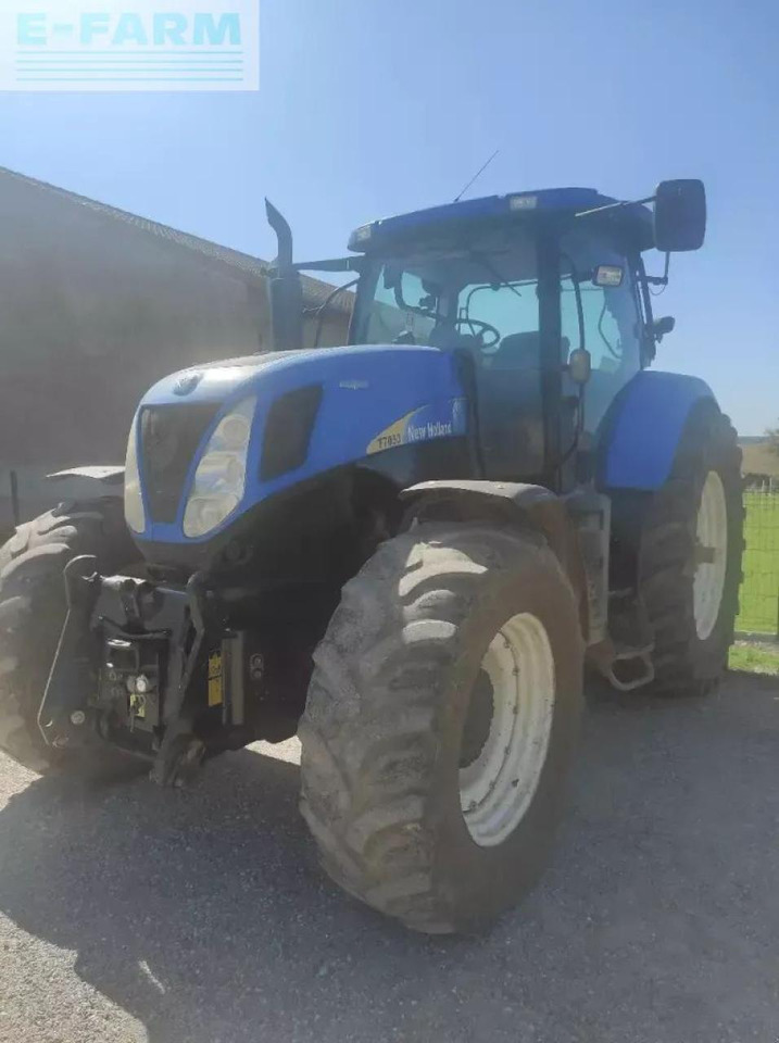 New Holland t7050 ac AC - Traktors: foto 2 New Holland t7050 ac AC - Traktors: foto 2