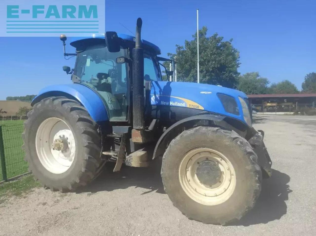 New Holland t7050 ac AC - Traktors: foto 3 New Holland t7050 ac AC - Traktors: foto 3