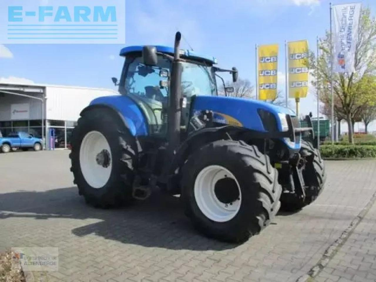 New Holland t7050 pc PC - Traktors: foto 4 New Holland t7050 pc PC - Traktors: foto 4