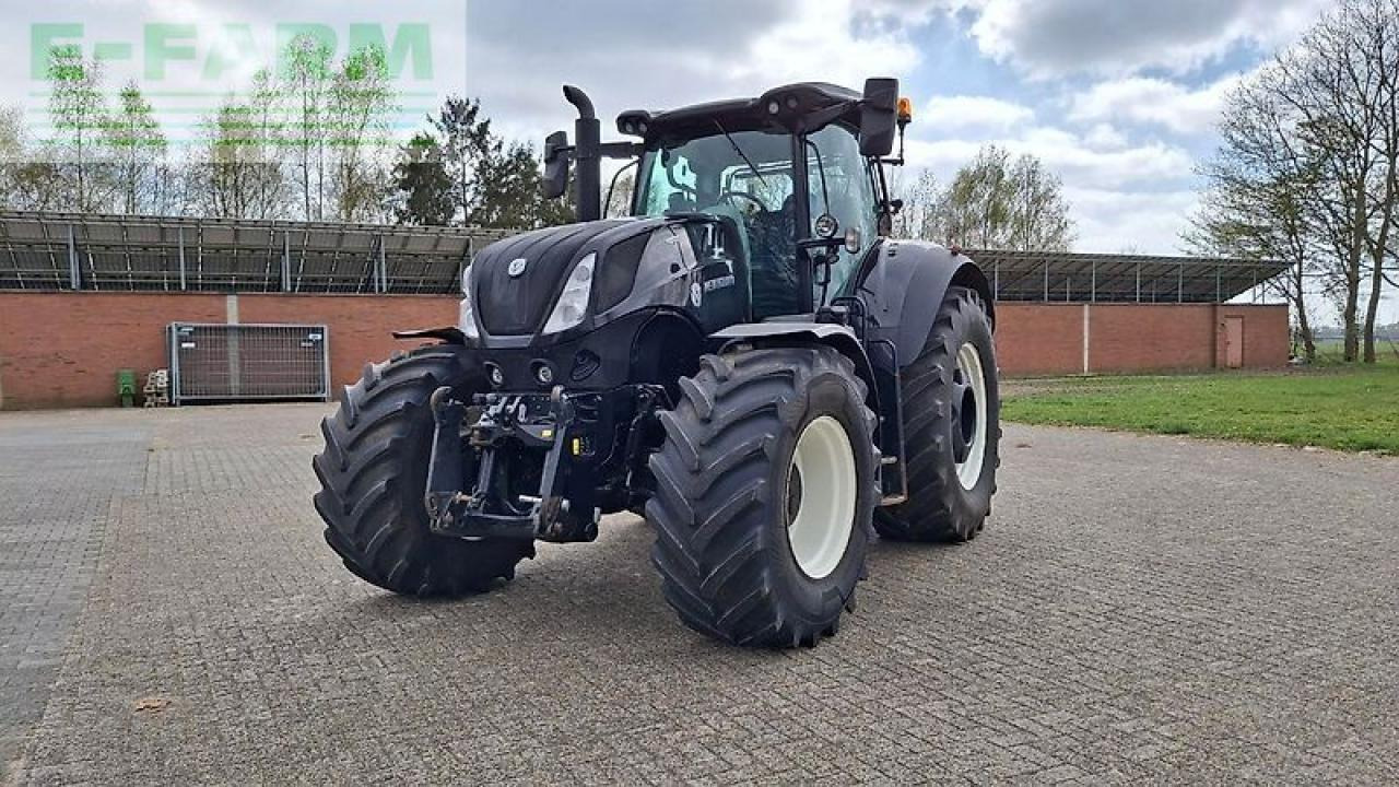 New Holland t7275 hd - Traktors: foto 1 New Holland t7275 hd - Traktors: foto 1