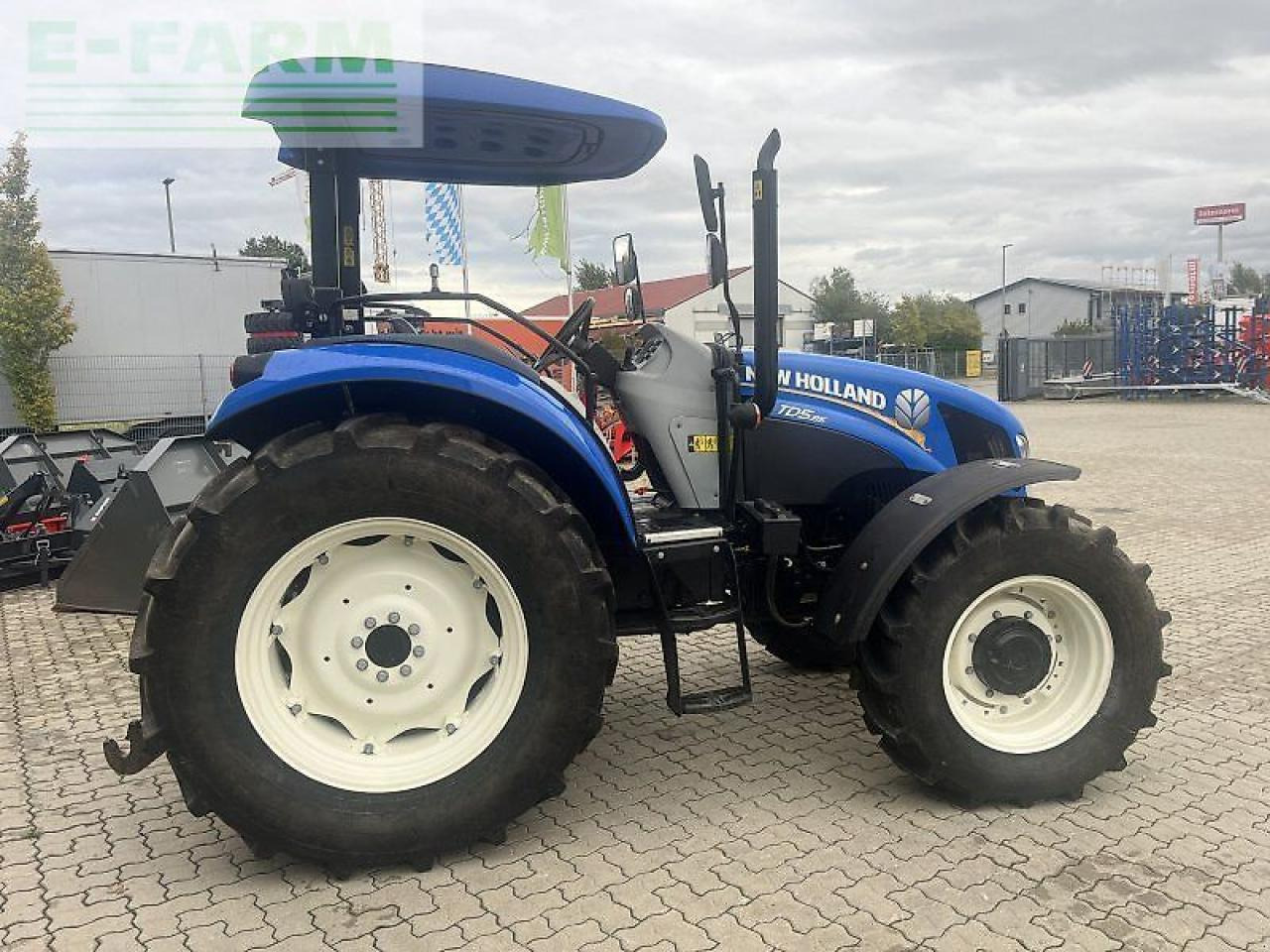New Holland td 5.85 - Traktors: foto 3 New Holland td 5.85 - Traktors: foto 3