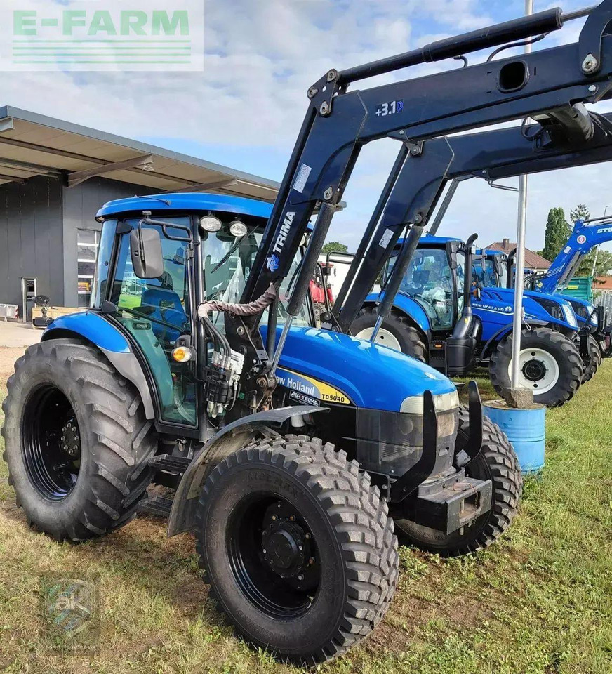 New Holland td5040 - Traktors: foto 1 New Holland td5040 - Traktors: foto 1
