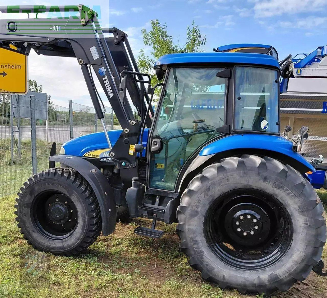 New Holland td5040 - Traktors: foto 4 New Holland td5040 - Traktors: foto 4