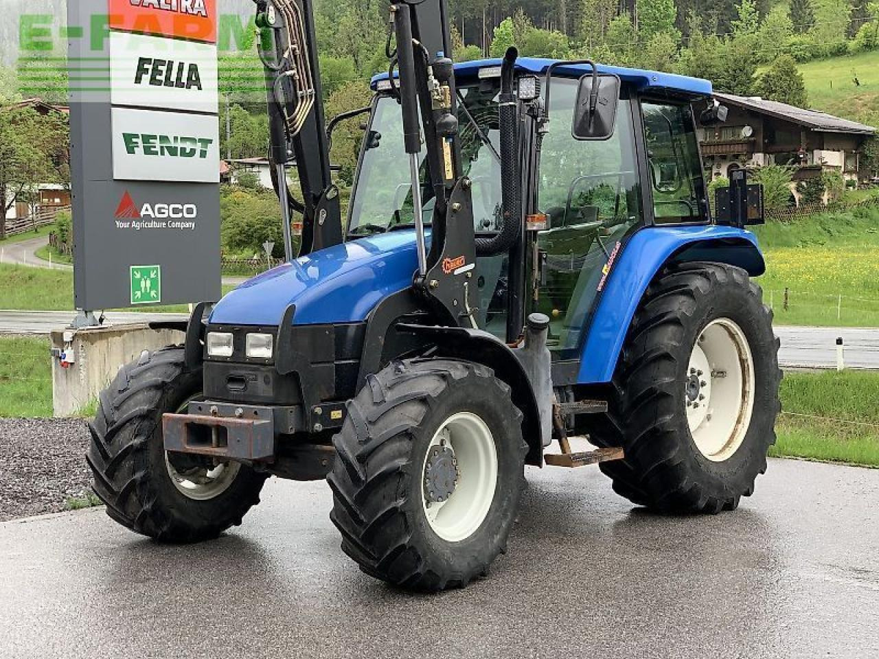New Holland tl 70 a + hauer frontlader A - Traktors: foto 2 New Holland tl 70 a + hauer frontlader A - Traktors: foto 2