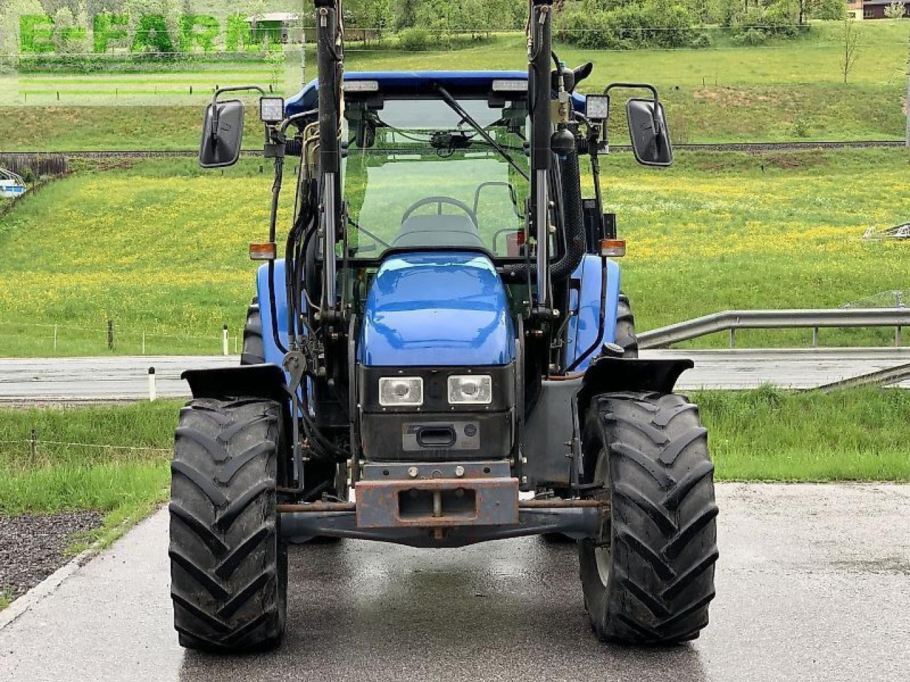New Holland tl 70 a + hauer frontlader A - Traktors: foto 4 New Holland tl 70 a + hauer frontlader A - Traktors: foto 4
