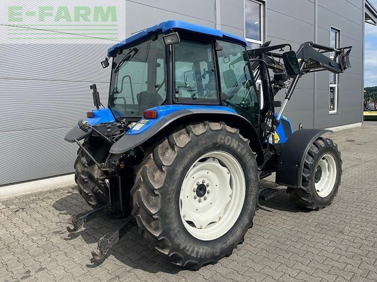 New Holland tl 90 a A - Traktors: foto 3 New Holland tl 90 a A - Traktors: foto 3
