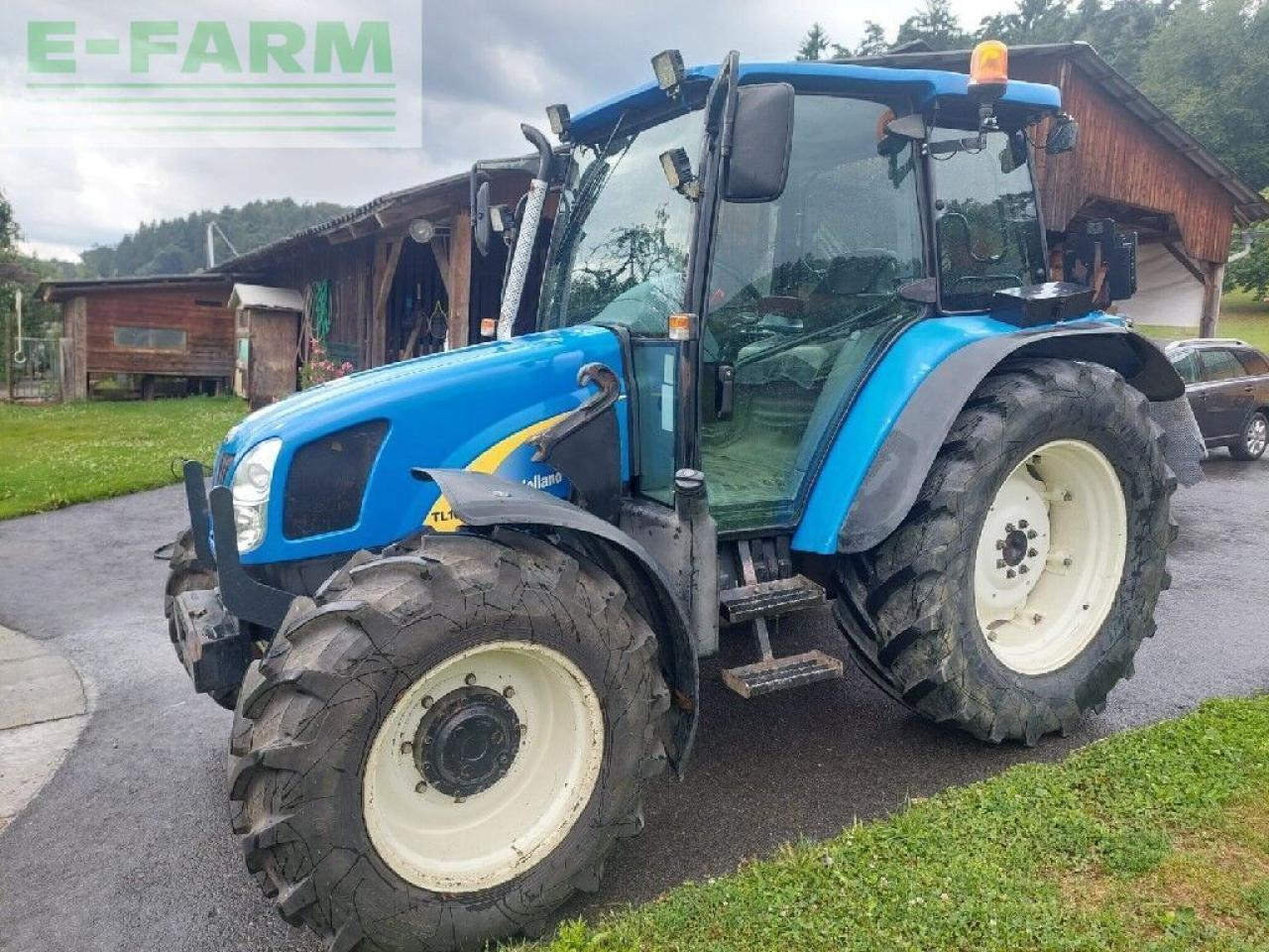 New Holland tl 90 a A - Traktors: foto 2 New Holland tl 90 a A - Traktors: foto 2
