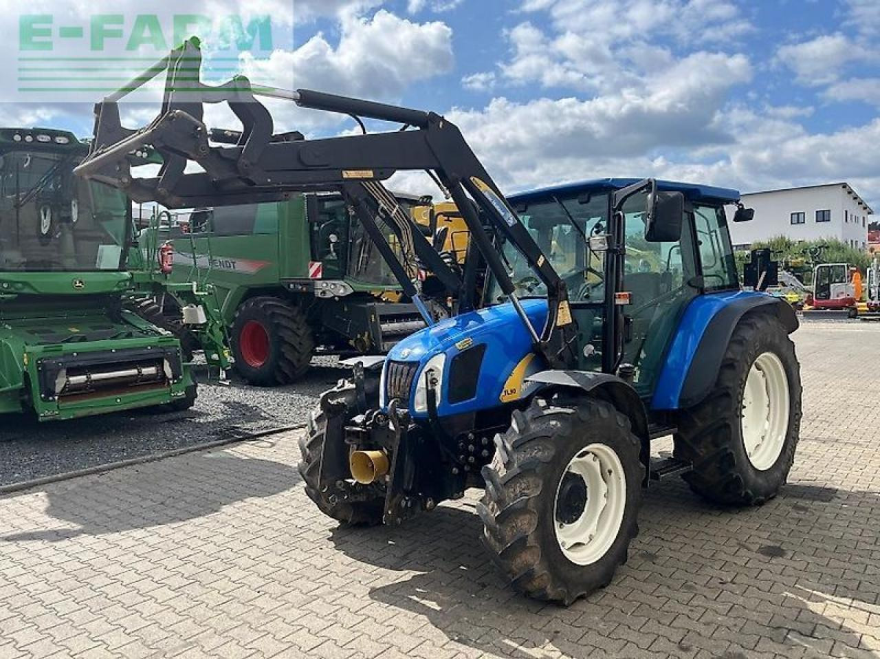 New Holland tl 90 a A - Traktors: foto 2 New Holland tl 90 a A - Traktors: foto 2