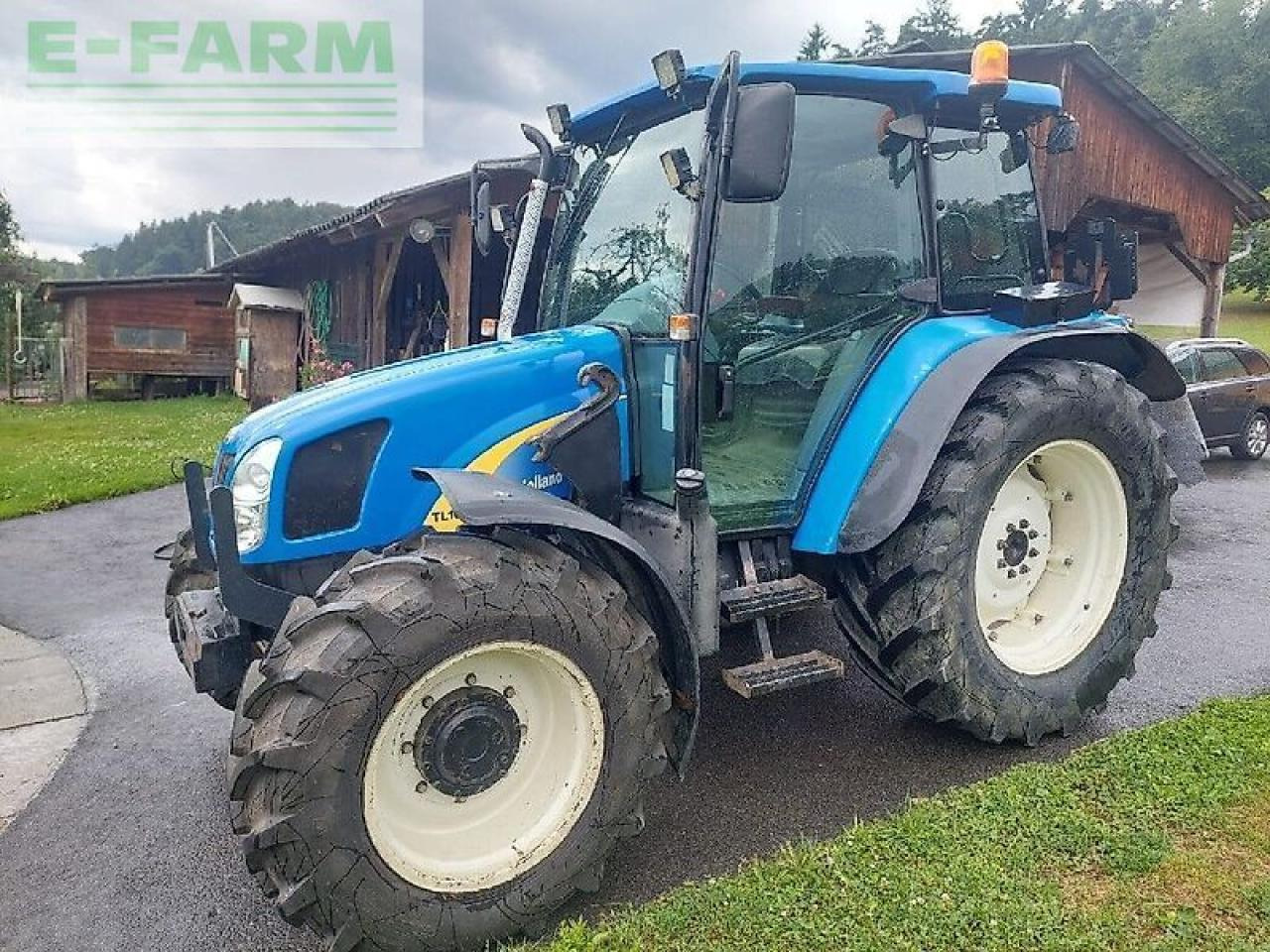 New Holland tl 90 a A - Traktors: foto 2 New Holland tl 90 a A - Traktors: foto 2