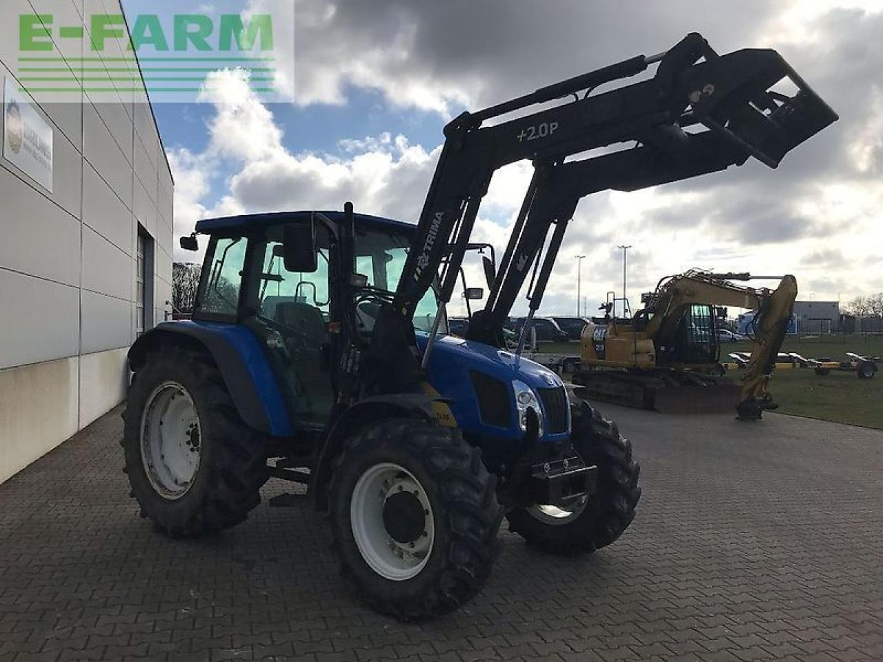 New Holland tl 90 a dt A - Traktors: foto 5 New Holland tl 90 a dt A - Traktors: foto 5