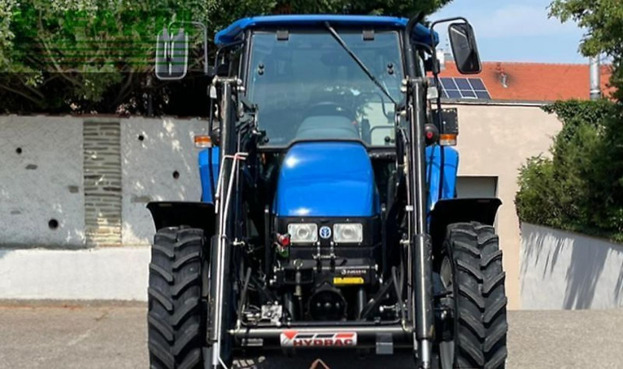 New Holland tl100 (4wd) - Traktors: foto 5 New Holland tl100 (4wd) - Traktors: foto 5