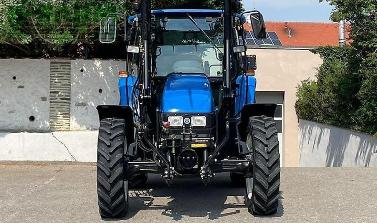 New Holland tl100 (4wd) - Traktors: foto 2 New Holland tl100 (4wd) - Traktors: foto 2