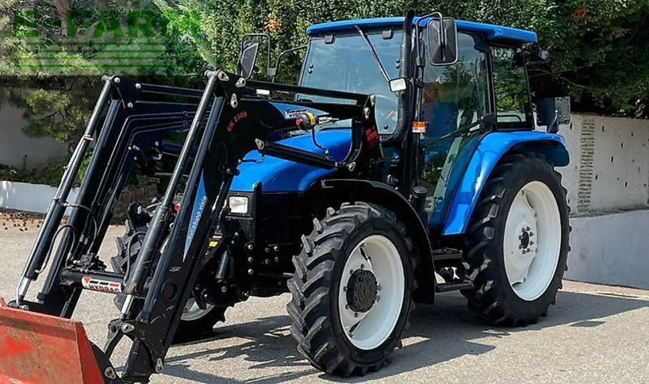 New Holland tl100 (4wd) - Traktors: foto 4 New Holland tl100 (4wd) - Traktors: foto 4