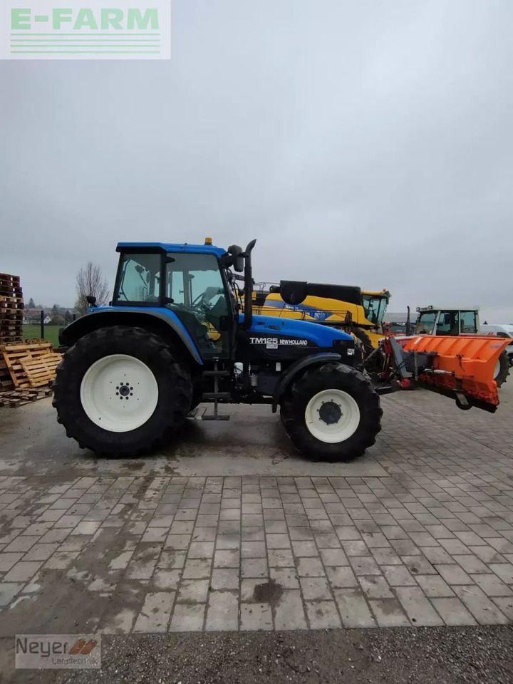 New Holland tm 125 - Traktors: foto 5 New Holland tm 125 - Traktors: foto 5