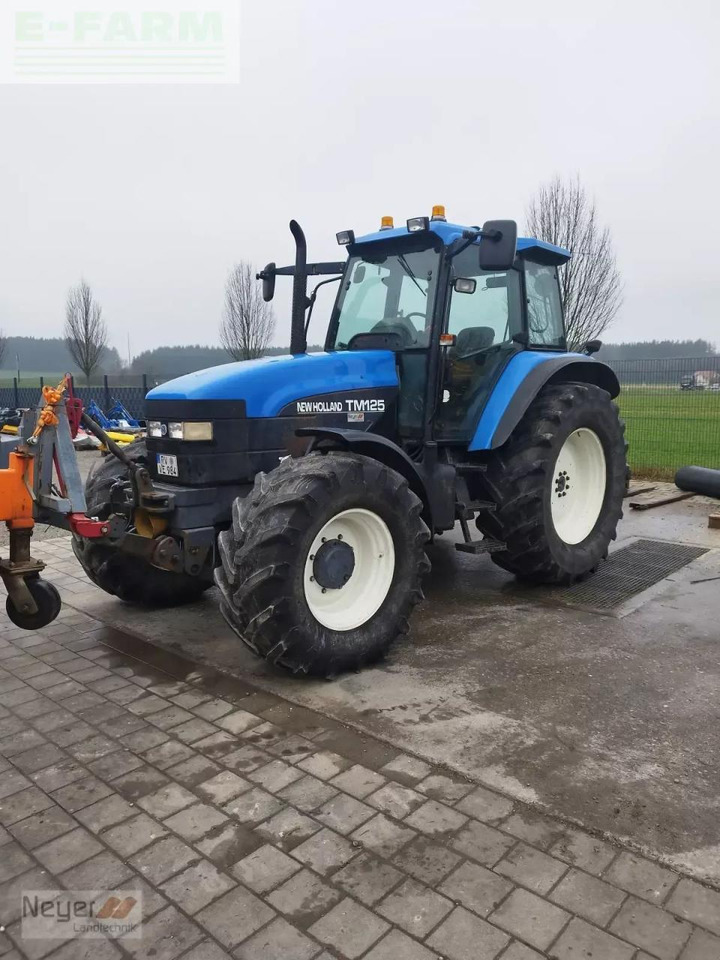 New Holland tm 125 - Traktors: foto 2 New Holland tm 125 - Traktors: foto 2