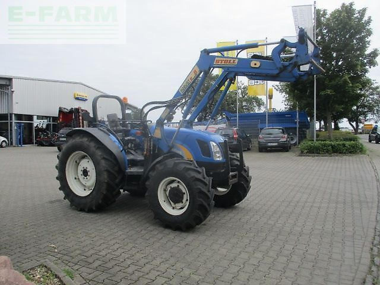 New Holland tn70 a niedrige bauhöhe - Traktors: foto 3 New Holland tn70 a niedrige bauhöhe - Traktors: foto 3