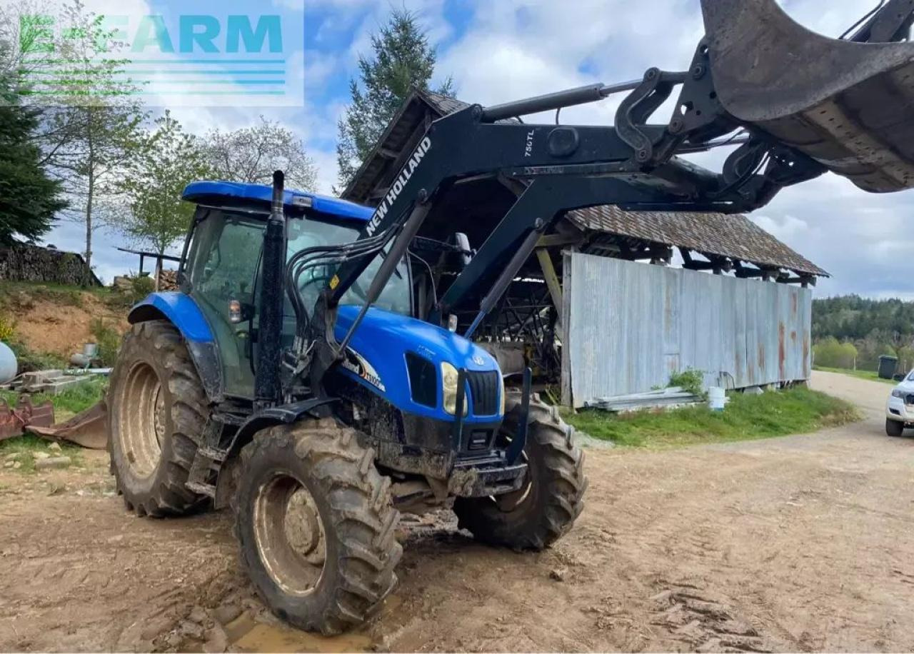 New Holland ts 100 a - Traktors: foto 1 New Holland ts 100 a - Traktors: foto 1
