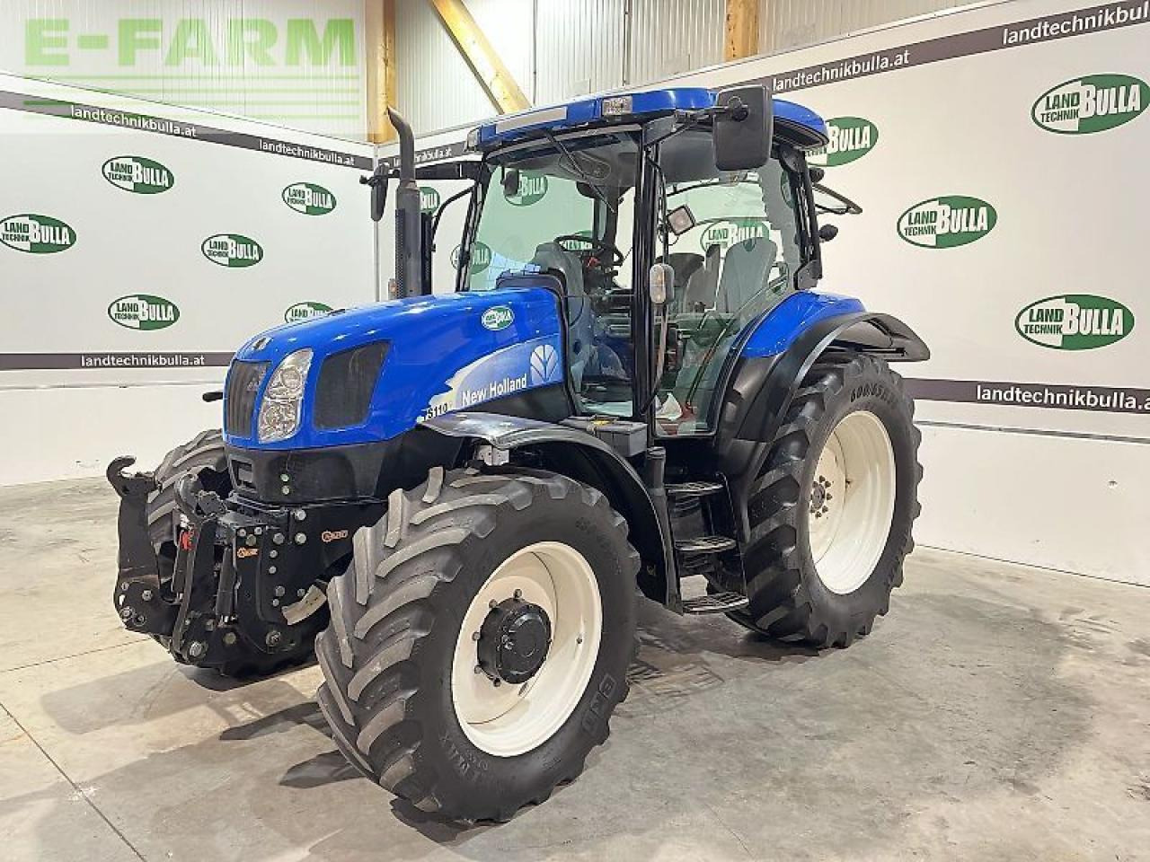 New Holland ts 115 - Traktors: foto 1 New Holland ts 115 - Traktors: foto 1