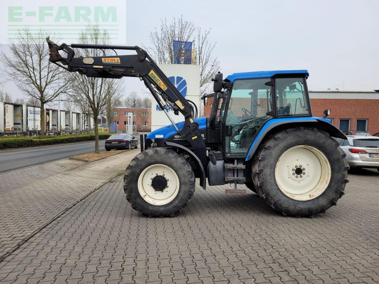 New Holland ts115 / ts 115 - Traktors: foto 1 New Holland ts115 / ts 115 - Traktors: foto 1