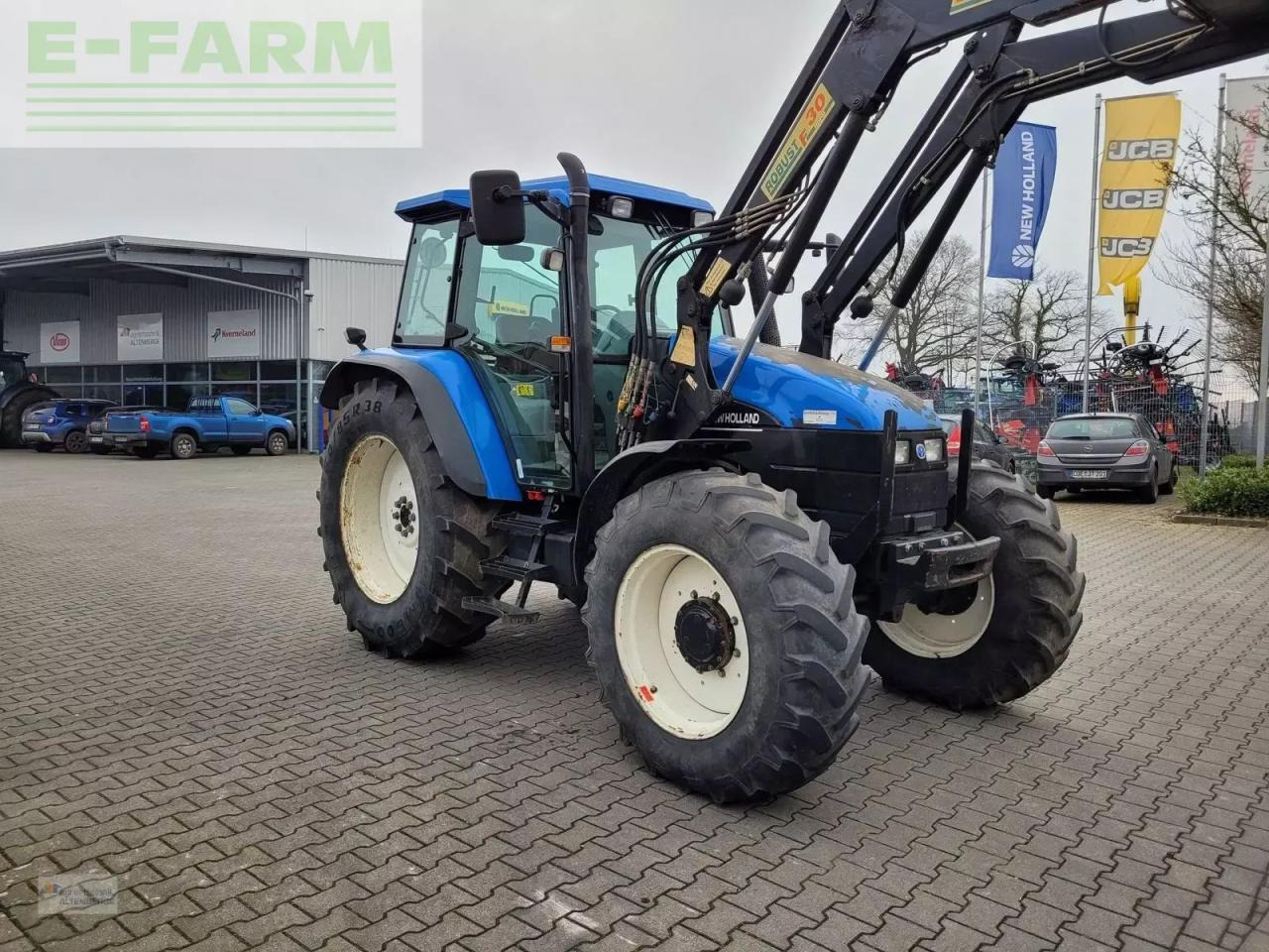 New Holland ts115 / ts 115 - Traktors: foto 2 New Holland ts115 / ts 115 - Traktors: foto 2