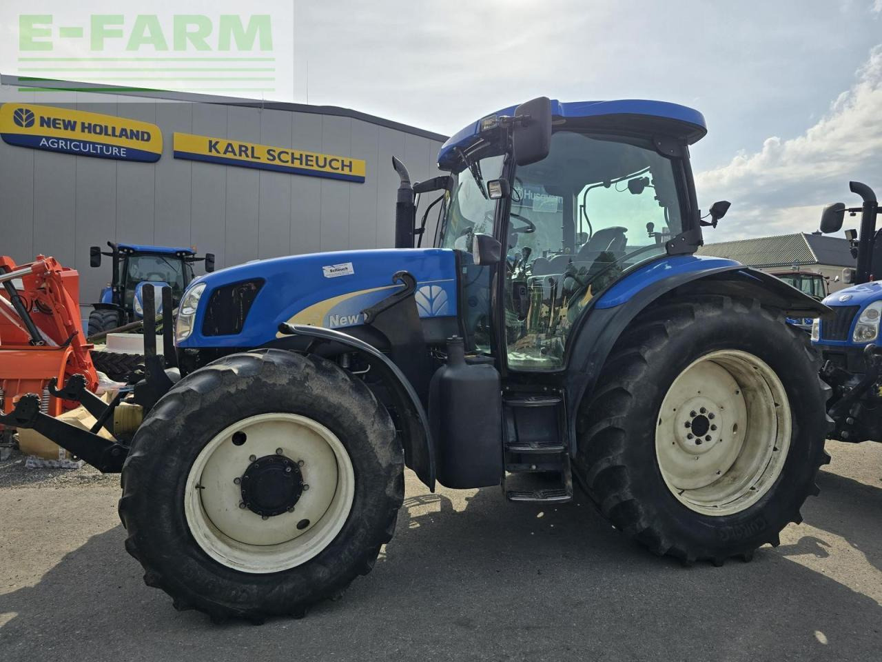 New Holland ts115a - Traktors: foto 1 New Holland ts115a - Traktors: foto 1