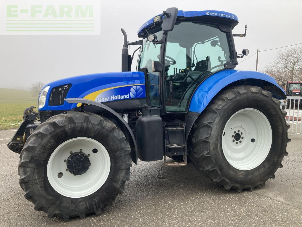 New Holland ts135a - Traktors: foto 2 New Holland ts135a - Traktors: foto 2