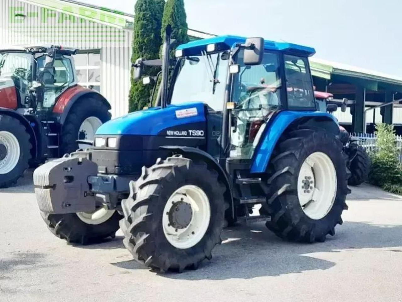 New Holland ts90 - Traktors: foto 1 New Holland ts90 - Traktors: foto 1