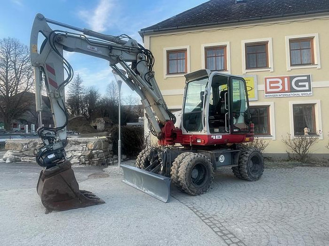 Takeuchi TB295W Mobilbagger - Ekskavators: foto 1 Takeuchi TB295W Mobilbagger - Ekskavators: foto 1