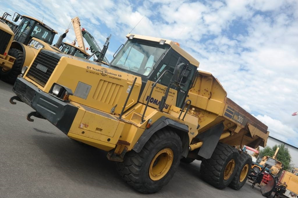 Komatsu HM 300-2 - Artikulētias pašizgāzējs: foto 4 Komatsu HM 300-2 - Artikulētias pašizgāzējs: foto 4