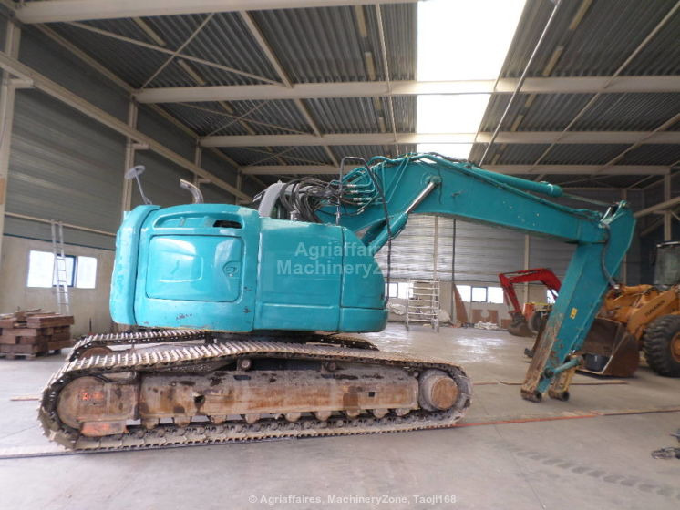 New Holland Kobelco Kobelco E 235 BSR-2 E 235 BSR-2 - Kāpurķēžu ekskavators: foto 2 New Holland Kobelco Kobelco E 235 BSR-2 E 235 BSR-2 - Kāpurķēžu ekskavators: foto 2