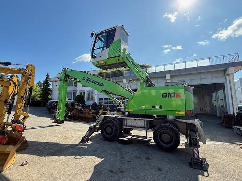Sennebogen 818 E - Atkritumu iekrāvējs: foto 1 Sennebogen 818 E - Atkritumu iekrāvējs: foto 1