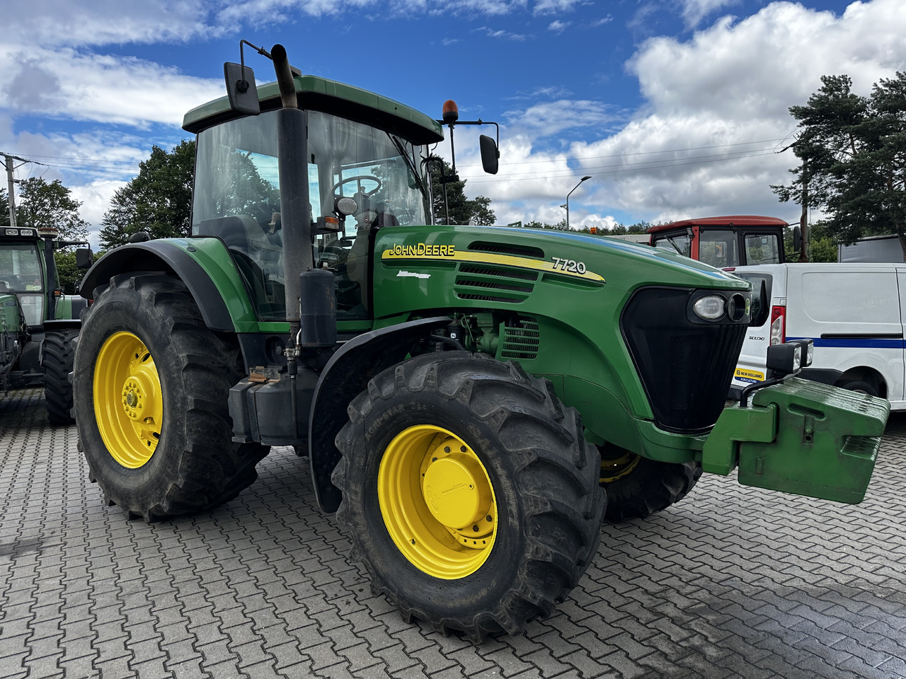John Deere 7720 PowerQuad - Traktors: foto 2 John Deere 7720 PowerQuad - Traktors: foto 2