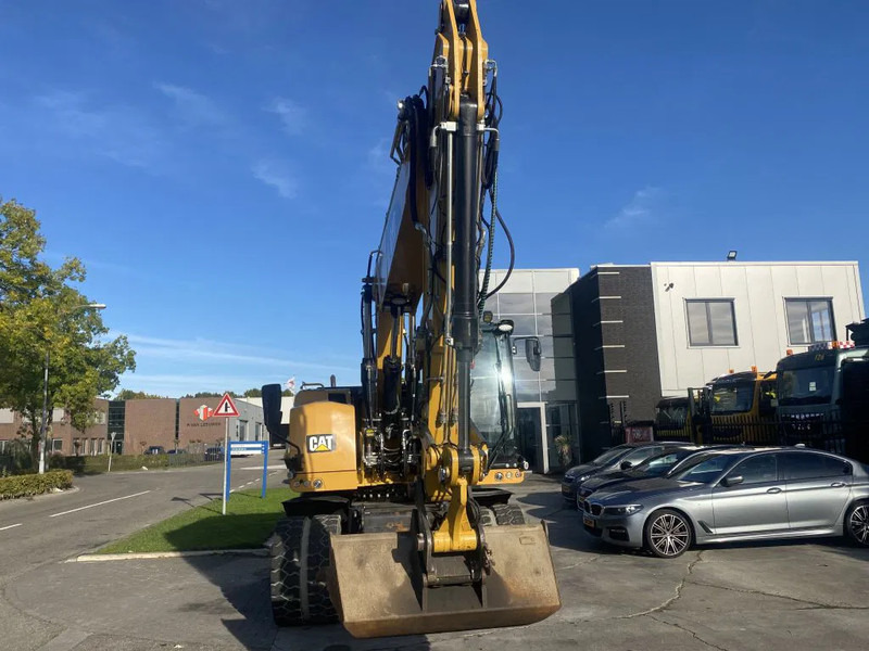 Caterpillar M318F - Riteņu ekskavators: foto 2 Caterpillar M318F - Riteņu ekskavators: foto 2
