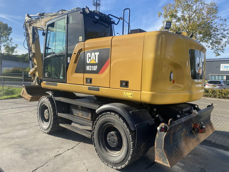 Caterpillar M318F - Riteņu ekskavators: foto 4 Caterpillar M318F - Riteņu ekskavators: foto 4