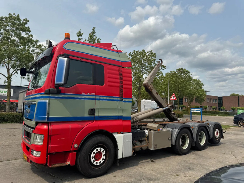 MAN TGX 35.540 - 8X4 - EURO 5 + AJK HOOK + LIFT/STEERING AXLE - Pacēlājs ar āķi: foto 1 MAN TGX 35.540 - 8X4 - EURO 5 + AJK HOOK + LIFT/STEERING AXLE - Pacēlājs ar āķi: foto 1