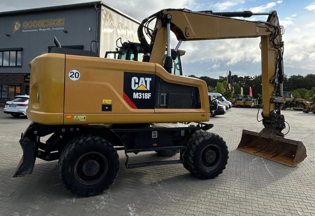CAT M 318 F - Riteņu ekskavators: foto 3 CAT M 318 F - Riteņu ekskavators: foto 3