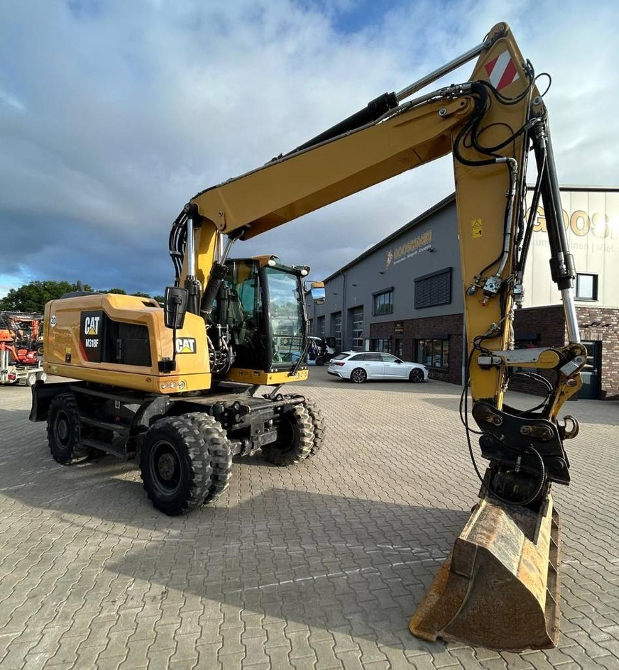 CAT M 318 F - Riteņu ekskavators: foto 2 CAT M 318 F - Riteņu ekskavators: foto 2