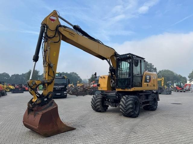CAT M 320 F  - Riteņu ekskavators: foto 1 CAT M 320 F  - Riteņu ekskavators: foto 1