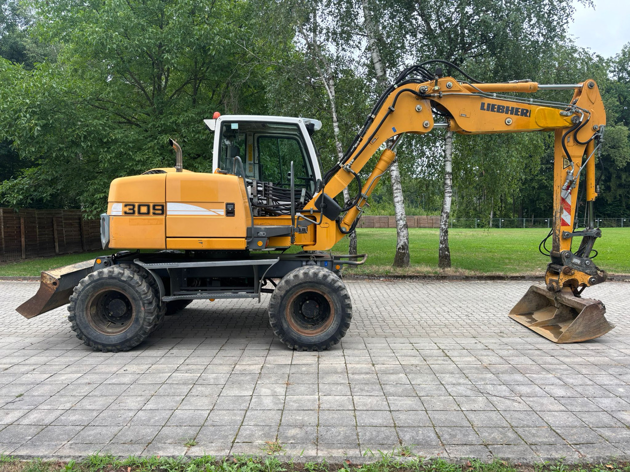 LIEBHERR A 309 Litronic - Riteņu ekskavators: foto 2 LIEBHERR A 309 Litronic - Riteņu ekskavators: foto 2